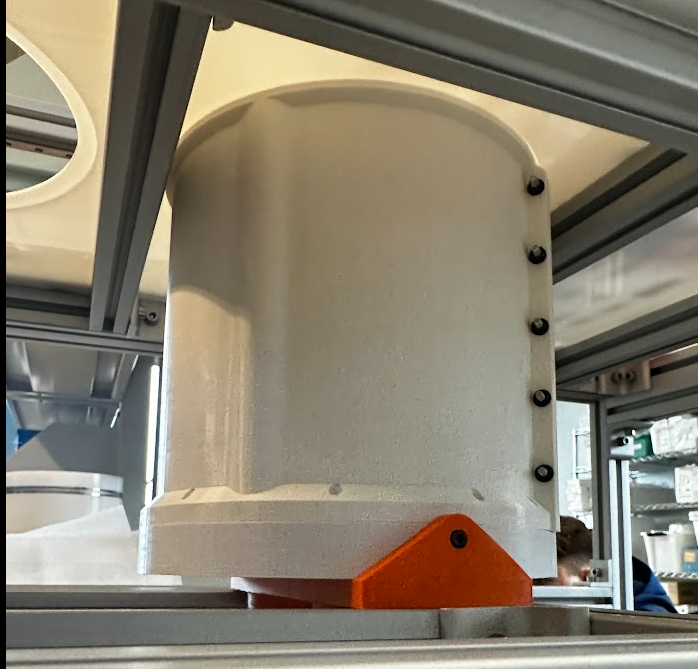 Outer sleeve installed into the bone printer piston assembly